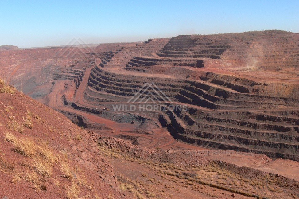 Curving haul roads inside the Super Pit open-cut mine. Kalgoorlie-Boulder, Australia.