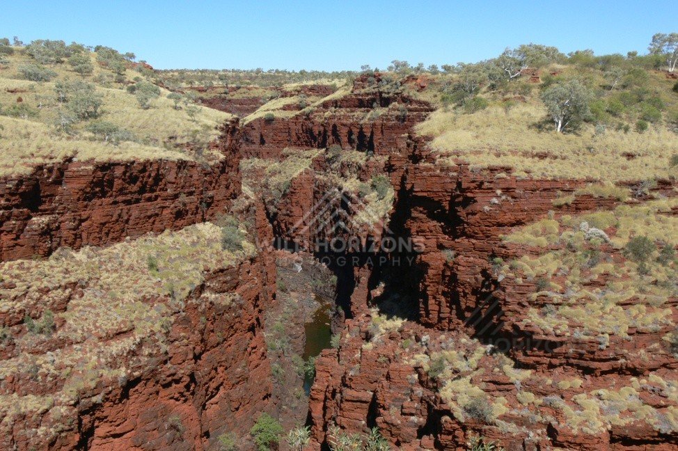 Red ironstone gorge within Karijini National Park. Pilbara, Australia.