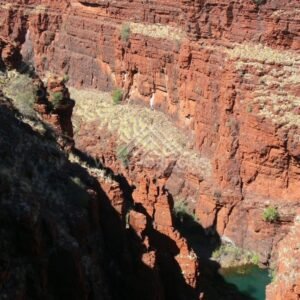 Deep red chasm walls of Dales Gorge in Karijini National Park. Pilbara, Australia.