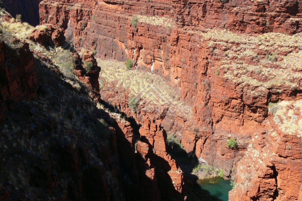 Deep red chasm walls of Dales Gorge in Karijini National Park. Pilbara, Australia.