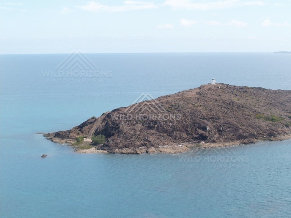 York Island with navigation light from the air. Cape York, Queensland, Australia.