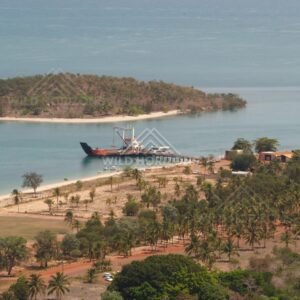 Seisia wharf with large vessel alongside. Seisia, Queensland, Australia.