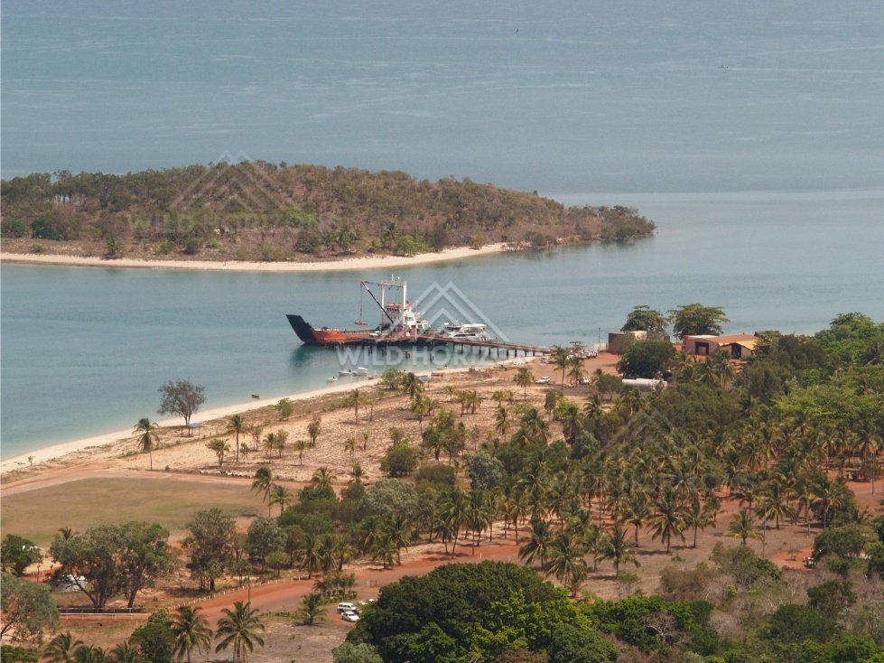 Seisia wharf with large vessel alongside. Seisia, Queensland, Australia.