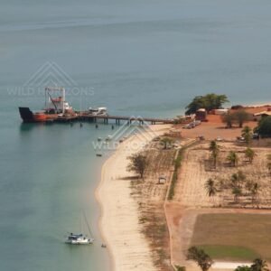 Seisia wharf and work barge from the air. Seisia, Queensland, Australia.