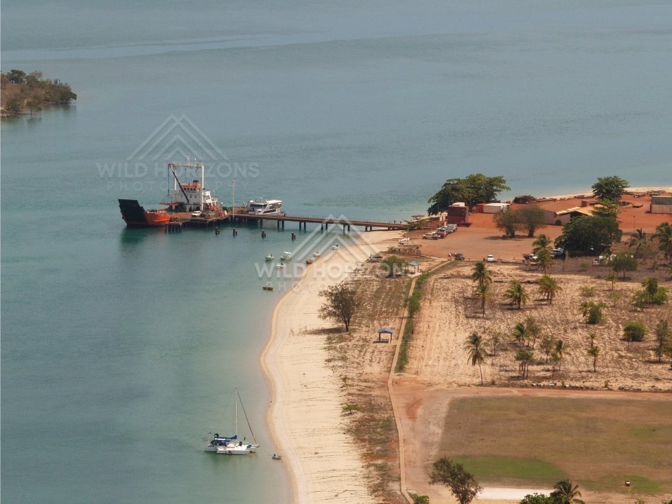 Seisia wharf and work barge from the air. Seisia, Queensland, Australia.