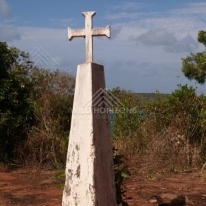 White Memorial Cross Standing Among Coastal Vegetation. Somerset, Australia.
