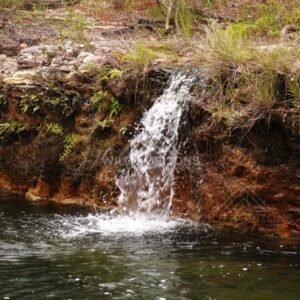 Side cascade entering a calm pool. Fruitbat Falls, Queensland, Australia.