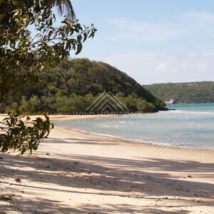 Sheltered Tropical Beach with Calm Water and Forested Headlands. Northern Cape York, Australia.