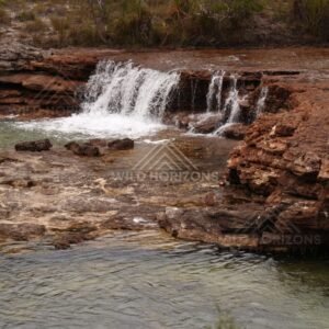 Step cascade across sandstone terrace. Fruitbat Falls, Queensland, Australia.