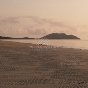 Rippled sand flats leading to a quiet bay in evening light. Portland Roads, Australia.