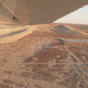 Aerial view across expansive red desert plains. Simpson Desert, Australia.