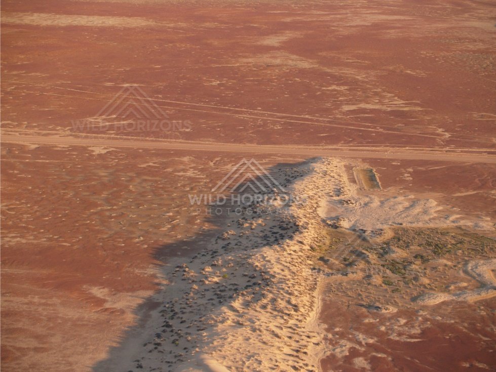 Remote desert facility beside a track. Simpson Desert, Australia.