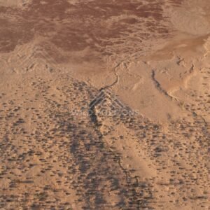 Low rolling dunes with evening shadows. Simpson Desert, Australia.