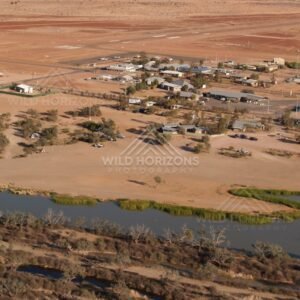 Lower aerial looking across Birdsville near the riverbank. Birdsville, Australia.