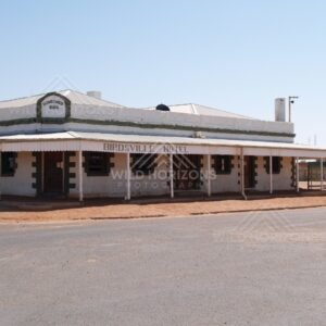 The Birdsville Hotel on a red dirt street. Birdsville, Australia.