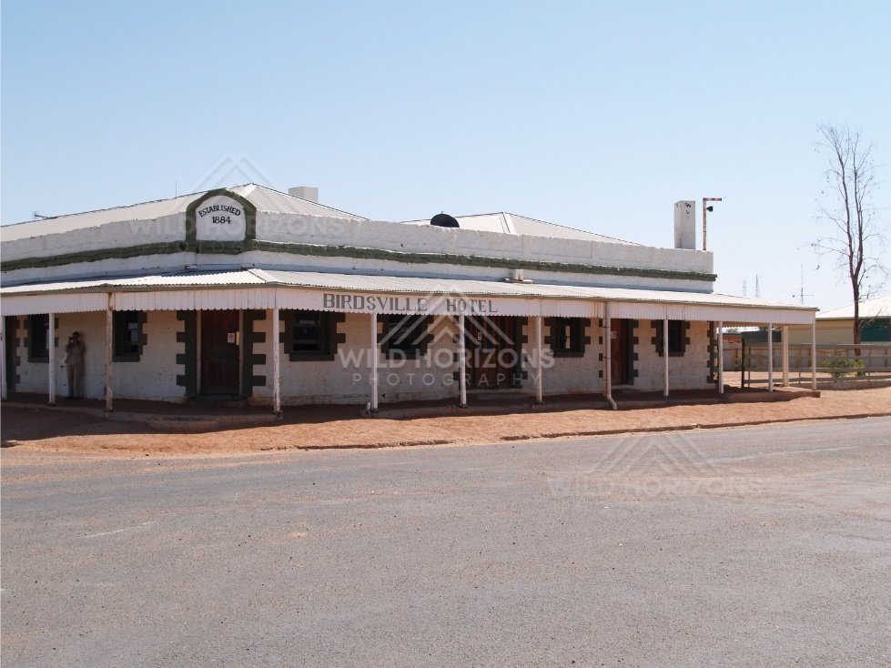 The Birdsville Hotel on a red dirt street. Birdsville, Australia.