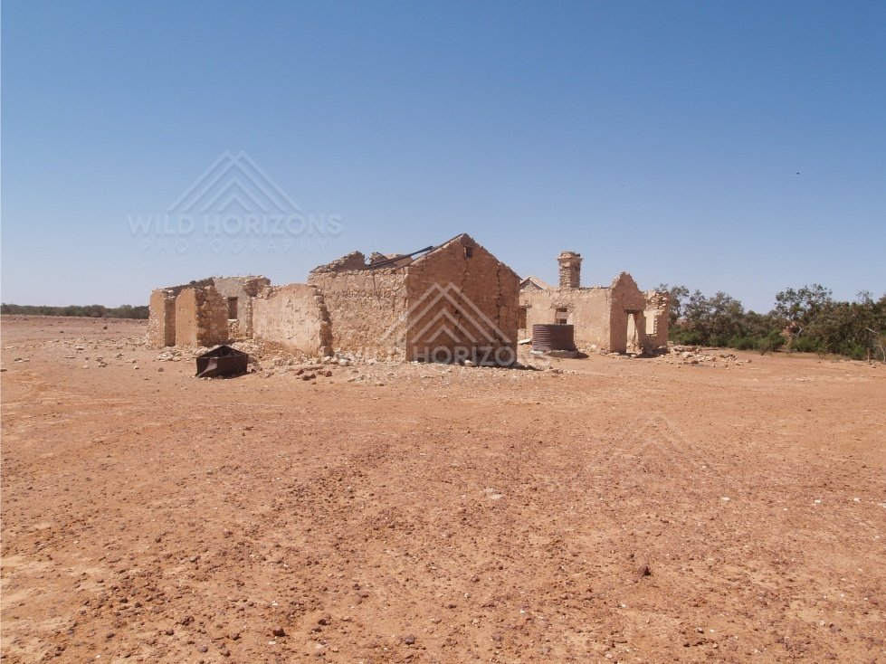 Ruined stone building on open plain. Queensland, Australia.