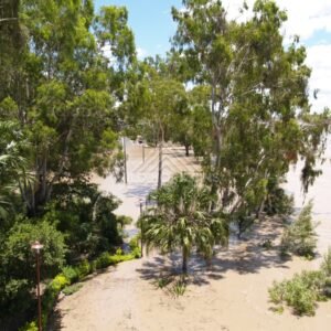 Flooded parkland beside the Fitzroy River. Rockhampton, Australia.