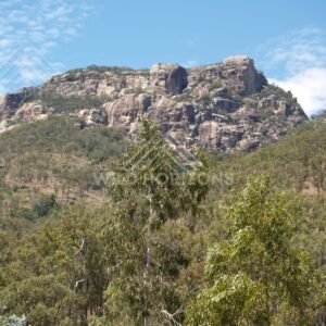 Granite range above coastal forest. Queensland, Australia.