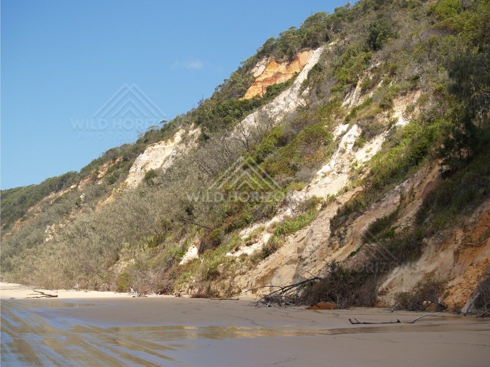 Sandstone cliffs above the beach. Rainbow Beach, Australia.