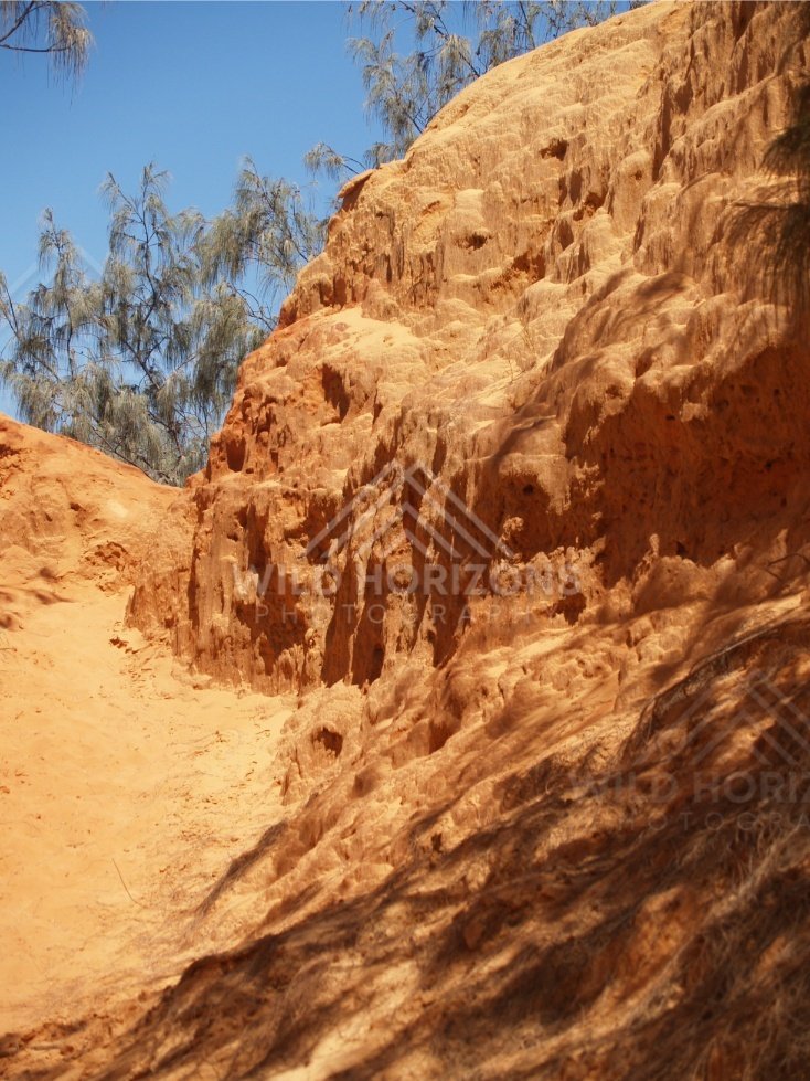 Narrow corridor in sandstone. Rainbow Beach, Australia.