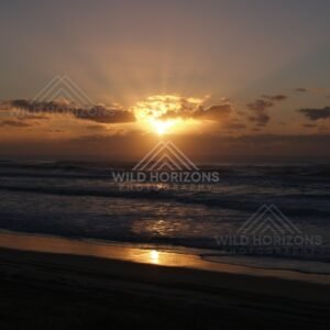 Sunset on Rainbow Beach shoreline. Queensland, Australia.