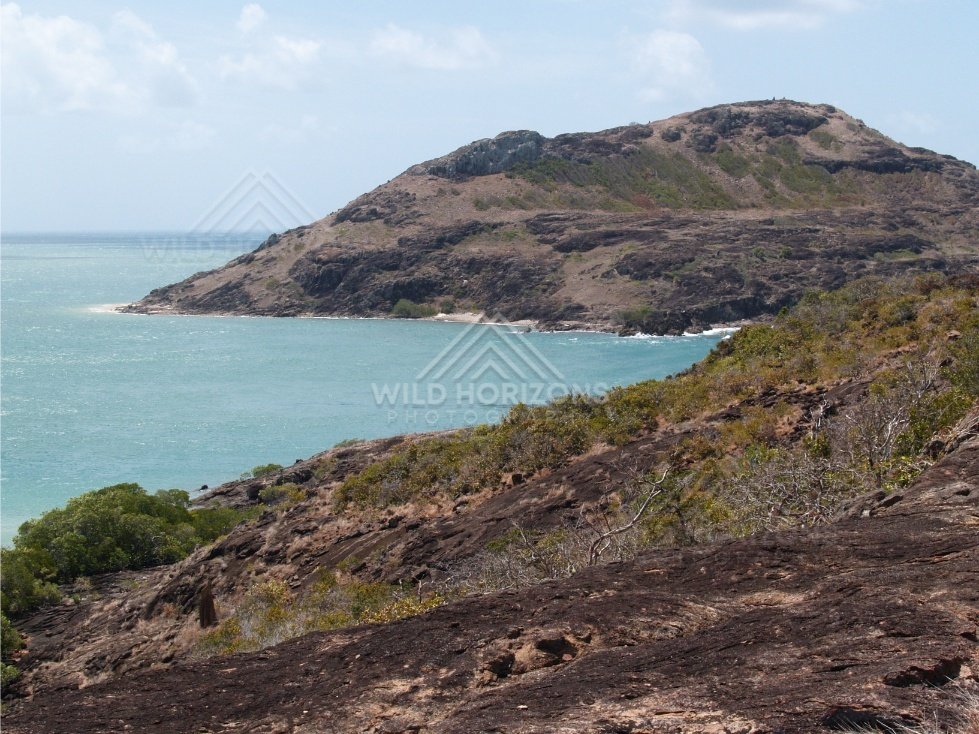 Rocky Coastal Ridge Rising Steeply from the Ocean. Cape York, Australia.