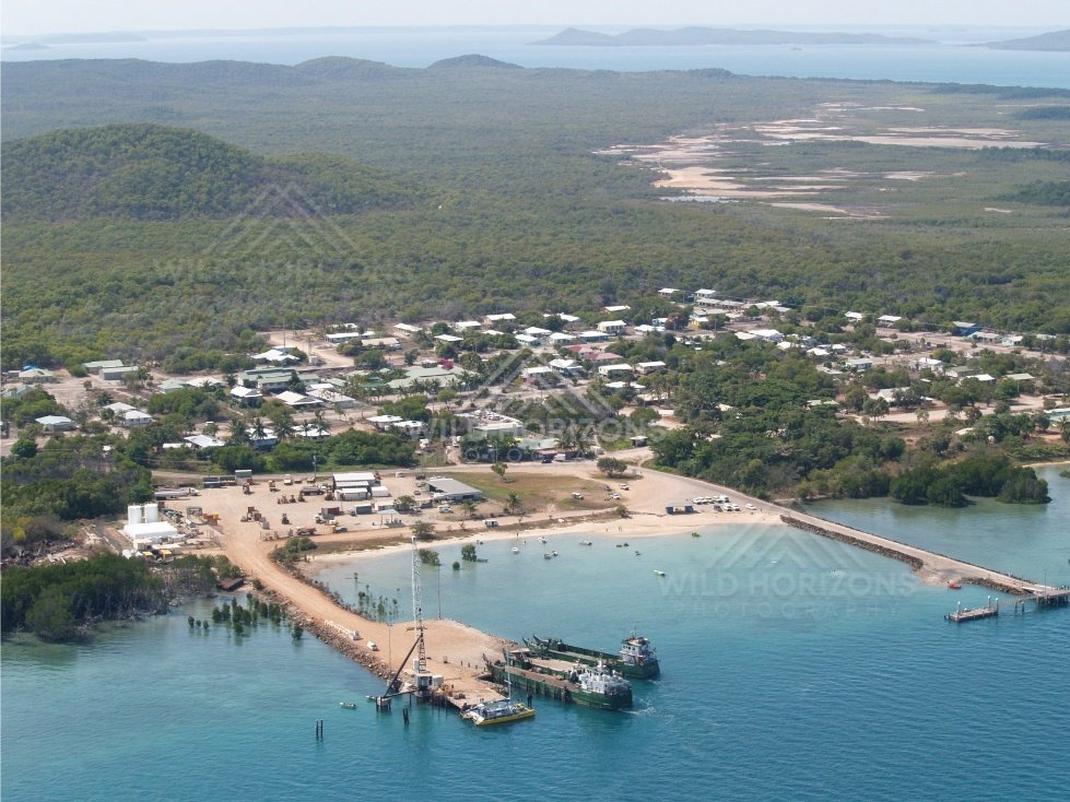 Wider aerial of Thursday Island settlement and hills. Thursday Island, Queensland, Australia.