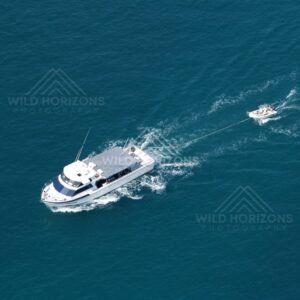 Large white vessel travelling across open sea. Thursday Island, Queensland, Australia.