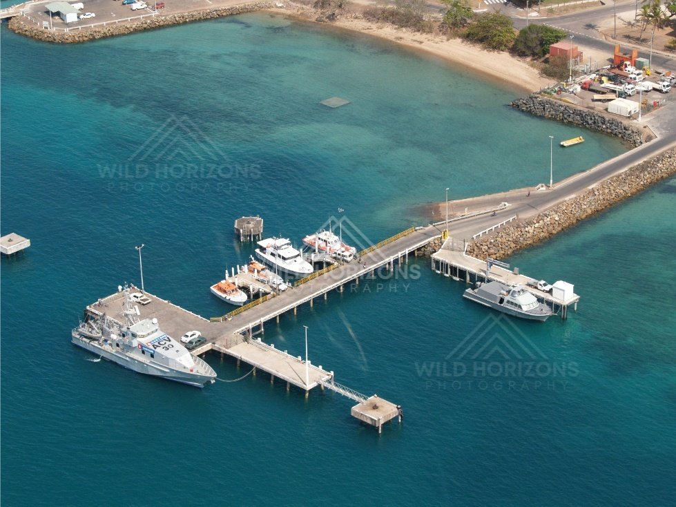 Aerial of marina and wharf with boats. Thursday Island, Queensland, Australia.