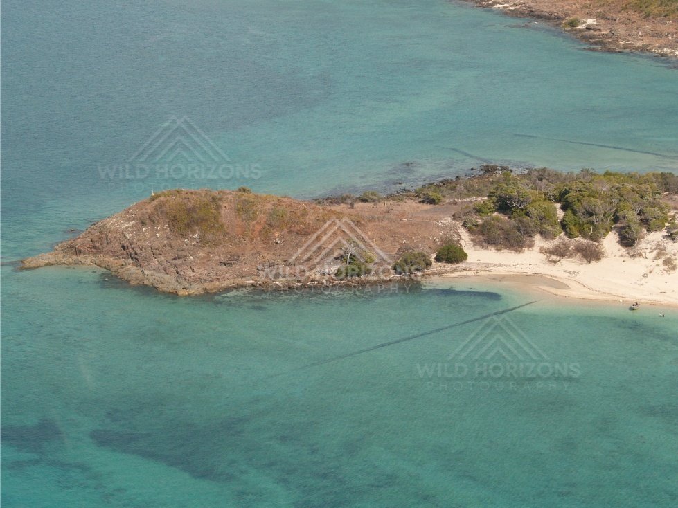 Low island with beach and reef flats. Thursday Island, Queensland, Australia.