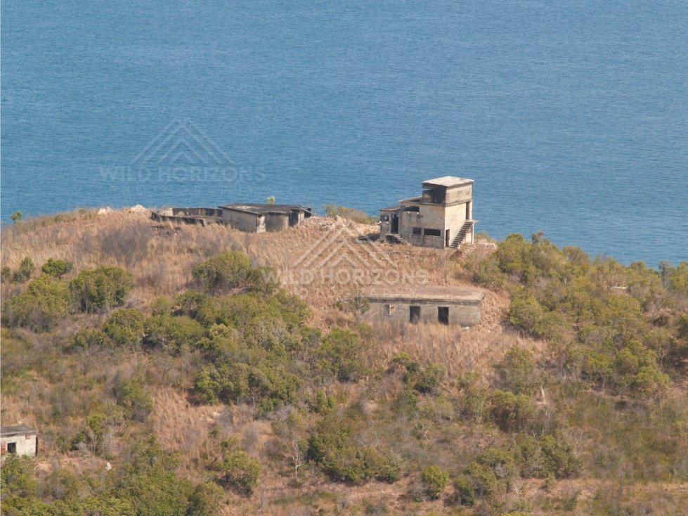 Historic structure on hill overlooking the sea. Possession Island, Queensland, Australia.